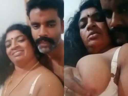 Telugu Xxx Video of a Man Squeezing a Milfs Big Boobs